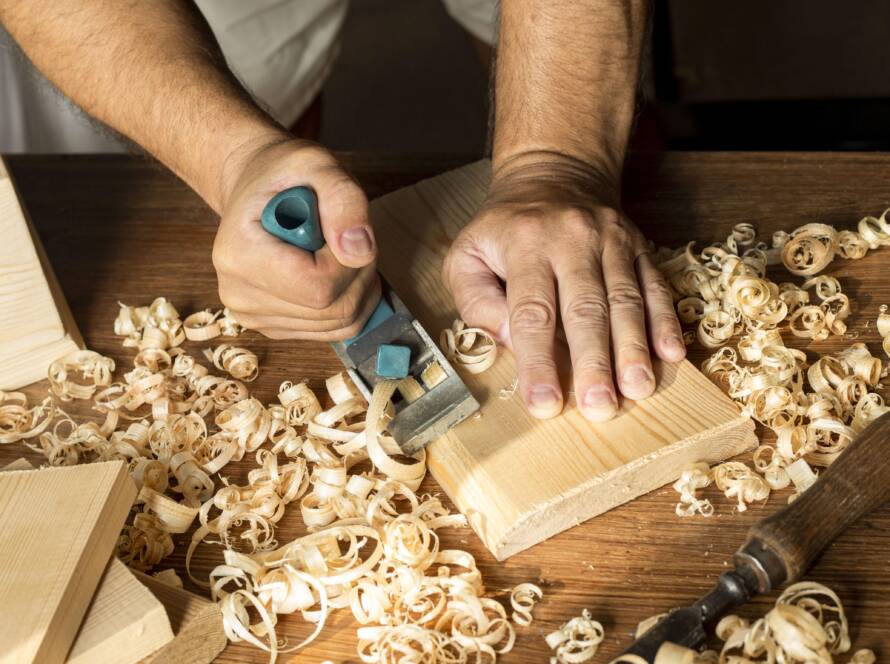 carpenter-working-with-his-bare-hands-wood